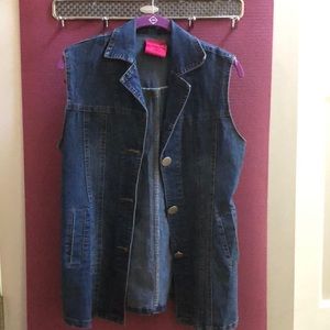 Denim jean-jacket vest with silver buttons.